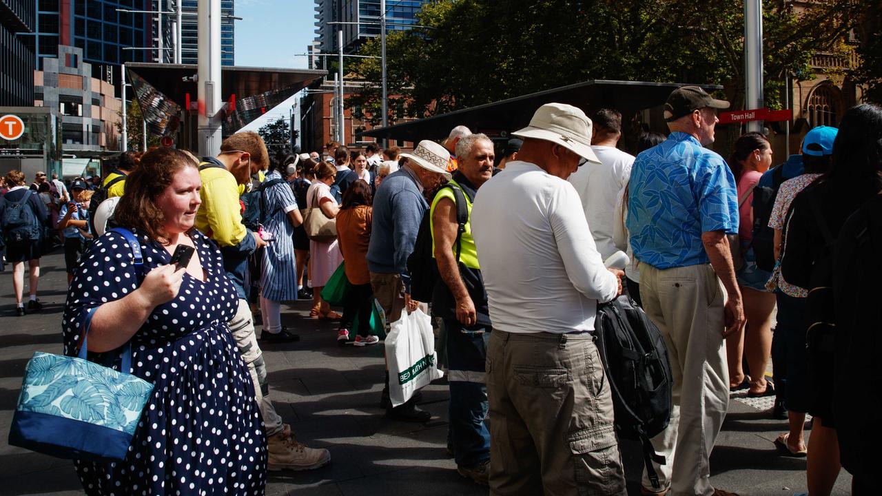 People leave Town Hall Station and wait for light rail in Sydney after the rail network closed on Wednesday afternoon. Picture: NCA NewsWire / Nikki Short