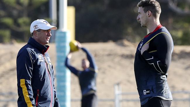 Former Adelaide senior coach Don Pyke talks to axed forward Josh Jenkins. Picture SARAH REED.