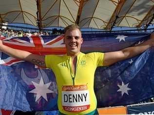 SILVER LINING: Allora's Matty Denny celebrates winning silver in the men's hammer at the Gold Coast Commonwealth Games. Picture: DEAN LEWINS