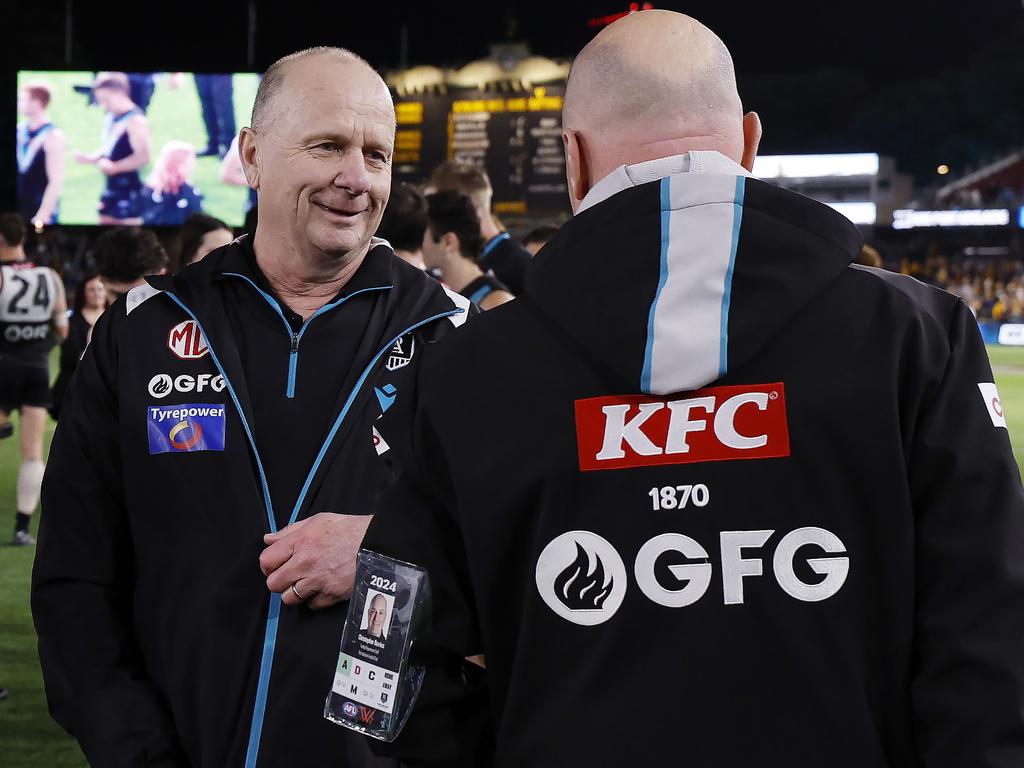 Hinkley and Port Adelaide’s football manager Chris Davies post-match. Picture: Michael Klein