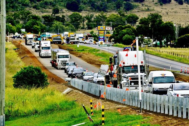 Traffic stretches back from the Summerholme Road exit on the Warrego Highway. A crash occurred about 8am near Rustys Oz Fuel service station. Initial reports were that a car has been crushed between two trucks. Extensive delays slowed traffic in both directions. Photo: Claudia Baxter / The Queensland Times. Picture: Claudia Baxter