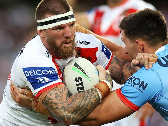 SYDNEY, AUSTRALIA - APRIL 25:  Josh McGuire of the Dragons is tackled during the round seven NRL match between the St George Illawarra Dragons and the Sydney Roosters at Sydney Cricket Ground, on April 25, 2022, in Sydney, Australia. (Photo by Mark Kolbe/Getty Images)