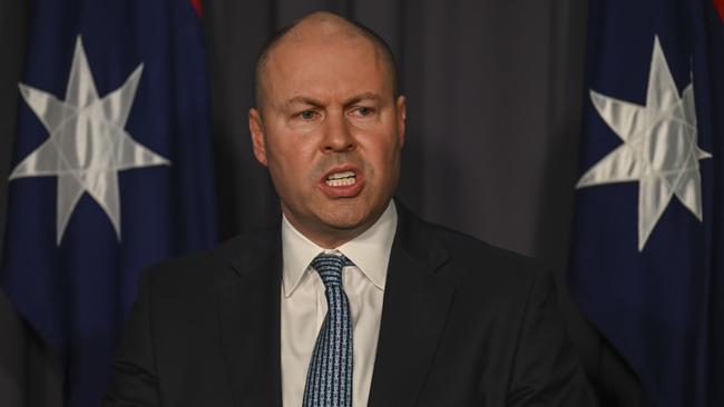 Josh Frydenberg says JobKeeper helped’ businesses keep their doors open and their staff employed’. Picture: Martin Ollman