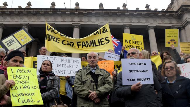 Taxi drivers protest on the steps of Parliament House, Melbourne Picture: Tracey Nearmy