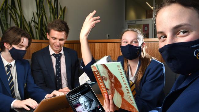 At Concordia College, Thomas, year 8, Clay Watkins (middle school leader), Hannah year 12 and Emily year 8, discussing whether books or TikTok is a good source of knowledge. Picture: Tricia Watkinson