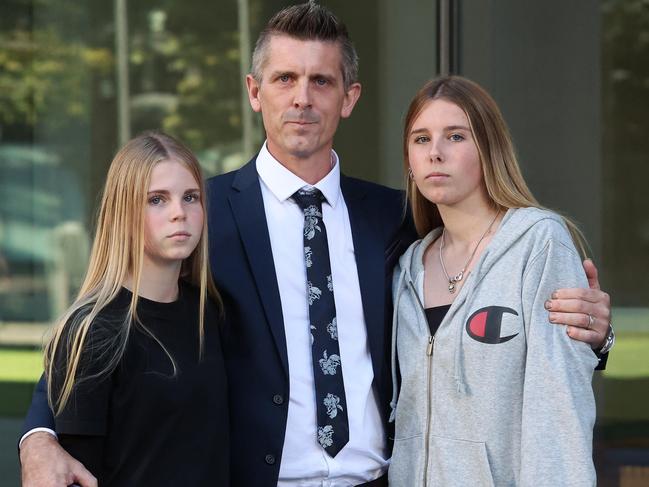 Lee Lovell with daughters Kassie and Scarlett outside court earlier this year