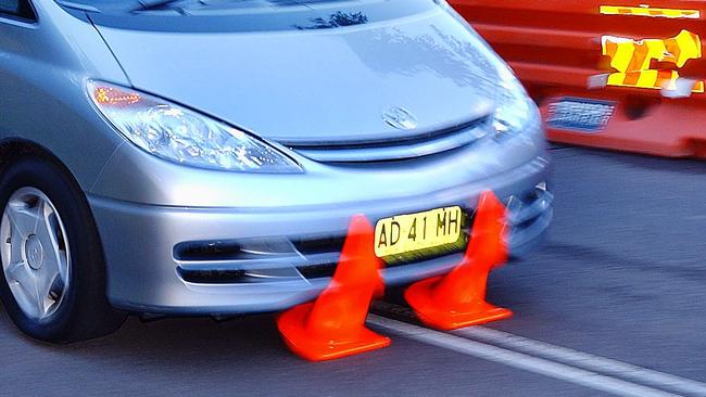 Anthony drove over traffic cones to get away with the car.