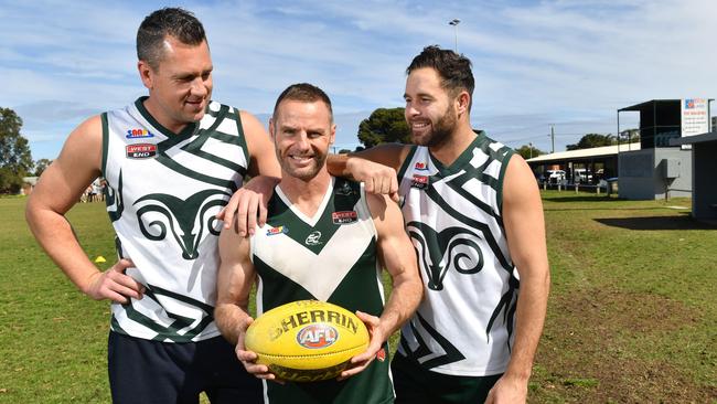 Seaton Ramblers’ Luke Walsh (left) and Bradyn Wild (right) with Marshall before his 450th game. He will play number 500 on Saturday. Picture: Keryn Stevens