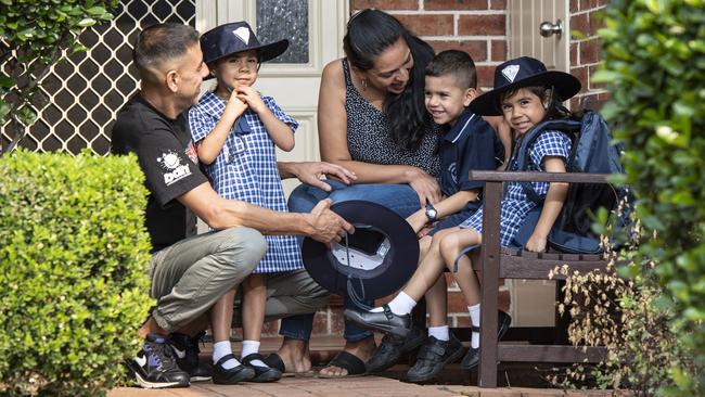 Daniella and Daniel Galgoczy prepare to take their triplets Andre, Alexia, Gia off for their first day of school. Picture: Monique Harmer