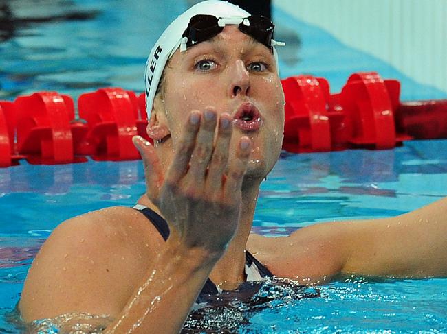 Klete Keller of the United States blows a kiss to the crowd after swimming in the 4x200-meter freestyle relay during preliminaries on Tuesday, August 12, 2008, in the Games of the XXIX Olympiad in Beijing, China.  (Photo by Jeff Siner/Charlotte Observer/Tribune News Service via Getty Images)