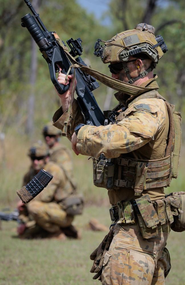 An Australian Army soldier from 3rd Battalion, Royal Australian Regiment, conducts an EF88 Austeyr rifle reload at Lavarack Barracks in Townsville, Queensland, during Exercise Opie Trophy 2022. Picture: Sergeant Andrew Sleeman