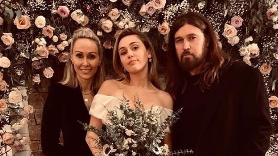Tish and Billy Ray Cyrus with daughter Miley at her short-lived marriage to another Aussie, Liam Hemsworth.