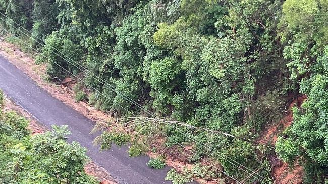 Ergon crews say sections of power poles and wires were wiped out by a landslide in the Mount Spec/Paluma area. Picture: Ergon