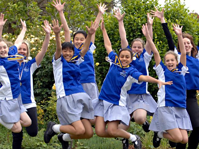 n20pp321 Fintona Girls� School students won second place in the Tournament of Minds competition.  (L-R) Anna, Lisa Broben (teacher), Julia, Sabina, Suzannah, Julia, Georgina, Katrina Morgan (teacher) and Eloise.