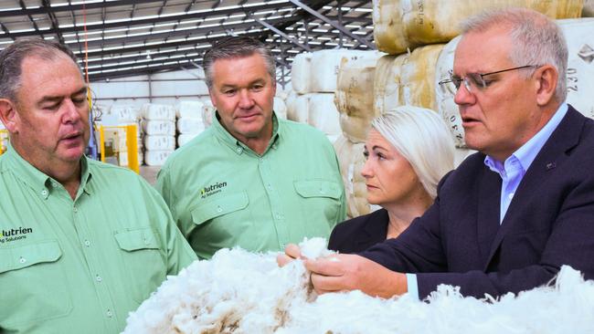 Nutrien Ag Solutions GM John Tuskin and state wool manager Stewart Raine with Liberal candidate for Lyons Suzie Bower and Prime Minister Scott Morrison at Nutrien's Evandale wool storage facility. Picture: Alex Treacy