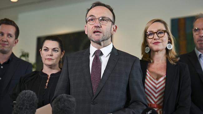 Greens leader Adam Bandt with party MPs in Canberra. Picture: NewsWire / Martin Ollman