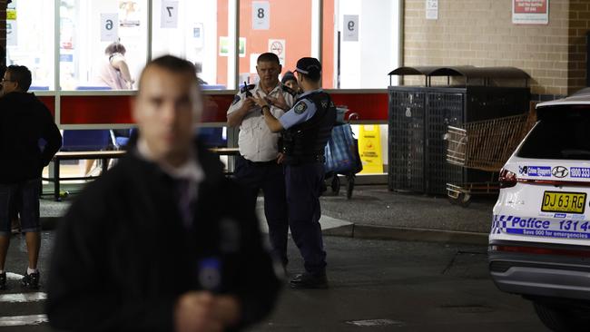 Officers were seen outside Liverpool Hospital. Picture: NCA NewsWire / Jonathan Ng,