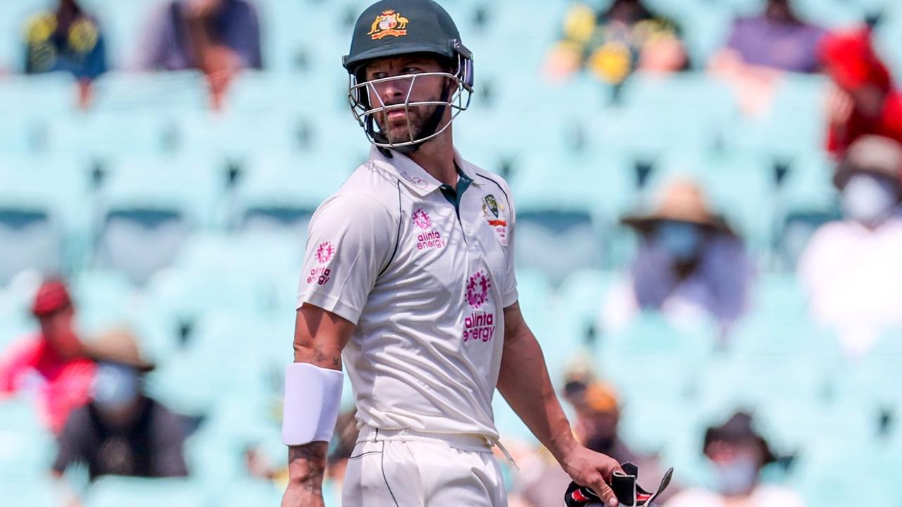 Australia’s Matthew Wade walks off the ground.