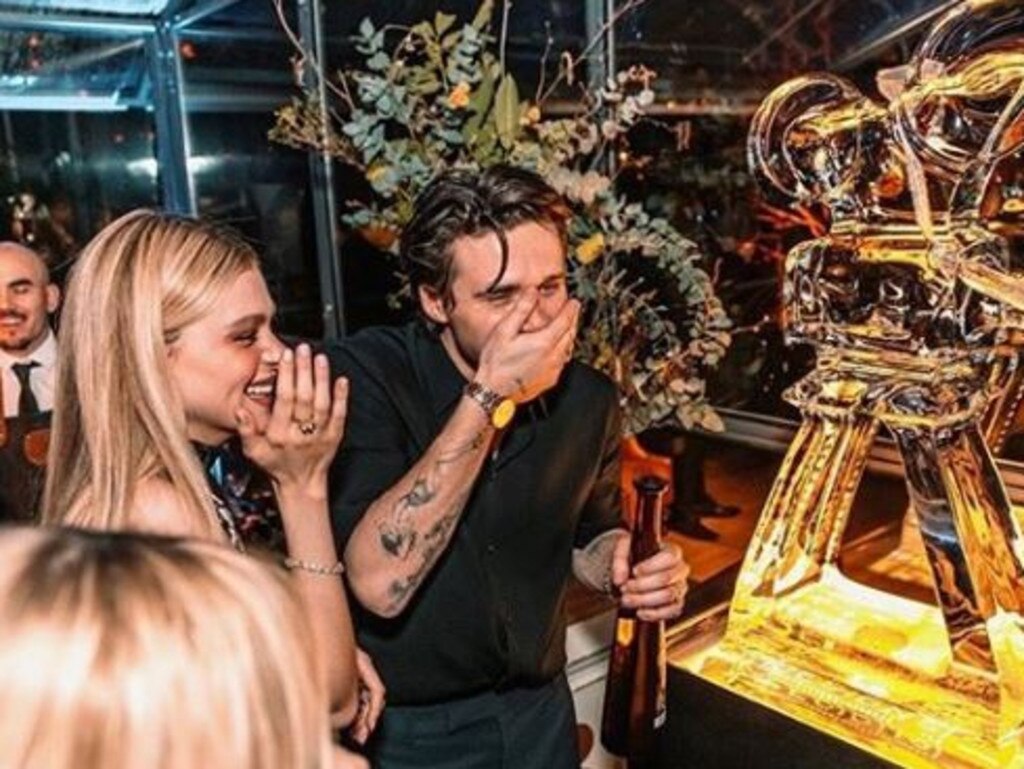 Photographer Brooklyn Beckham looked pretty impressed by an ice sculpture of a camera at his big bash. Picture: Instagram