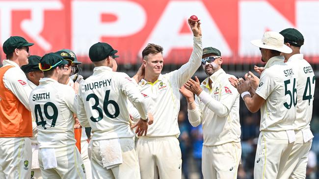 Matthew Kuhnemann celebrates his five-wicket haul. Picture: AFP