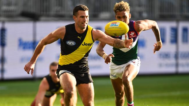 Jack Graham under pressure from Docker Liam Henry. Picture: Daniel Carson/AFL Photos