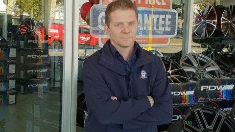 Dandenong Bob Jane T Mart owner Neil Finlayson is calling for more police after his business was robbed for the fifth time in seven years.