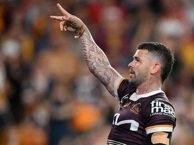 BRISBANE, AUSTRALIA - AUGUST 23: Adam Reynolds of the Broncos celebrates scoring a try during the round 25 NRL match between Brisbane Broncos and Parramatta Eels at Suncorp Stadium, on August 23, 2024, in Brisbane, Australia. (Photo by Matt Roberts/Getty Images)