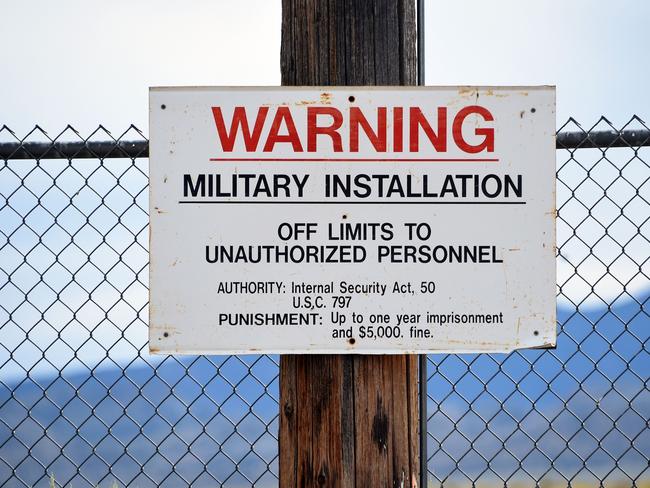 RACHEL, NEVADA - JULY 22: A warning sign is posted at the back gate at the top-secret military installation at the Nevada Test and Training Range known as Area 51 on July 22, 2019 near Rachel, Nevada. A Facebook event entitled, 