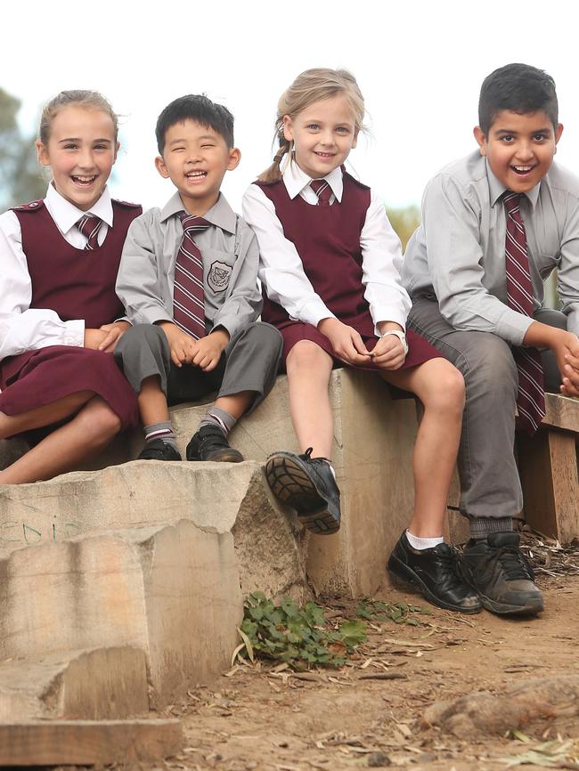 Crestwood Primary School students Mia Rowe, 11, Joshua Kang, 5, Stella van der Steege, 7, and Devaang Parasher, 12 ahead of their mufti day fundraiser for farmers. Picture: Richard Dobson