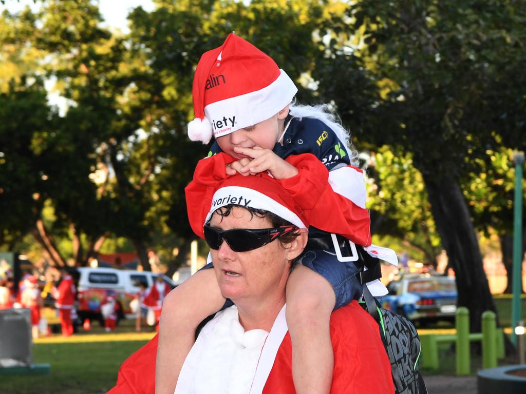 Belinda Reebe and Rohdy Overeem, 4, at the Darwin Santa Fun Run in July at Mindil Beach. Picture Katrina Bridgeford