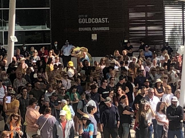 The "silent" Covid-19 protest outside Gold Coast City Council Chambers on Tuesday morning. Picture: Kyle Wisniewski