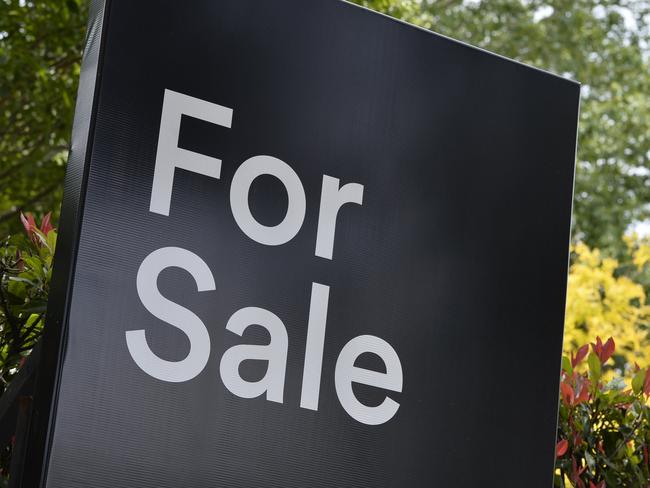 A real estate For Sale sign on a property in East Toowoomba, house for sale, Thursday, December 21, 2017.