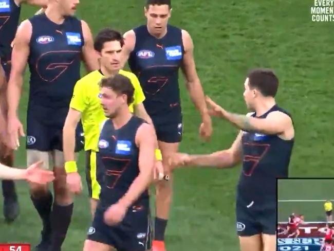 Stills from vision showing Greater Western Sydney star Toby Greene walking away from the umpire after contact. Picture Fox Sports.