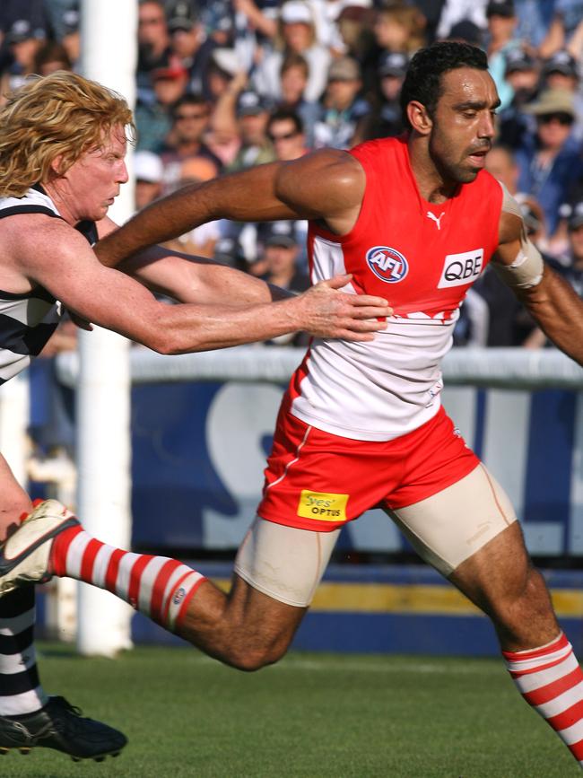 Cameron Ling keeps a close eye on Adam Goodes.