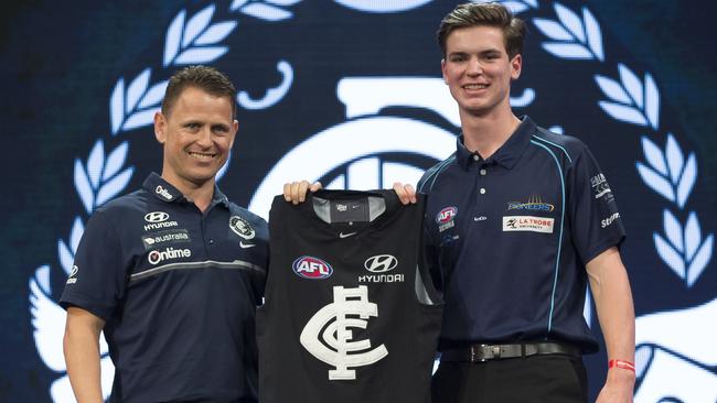 Paddy Dow with Carlton coach Brendon Bolton. Picture: AAP Images