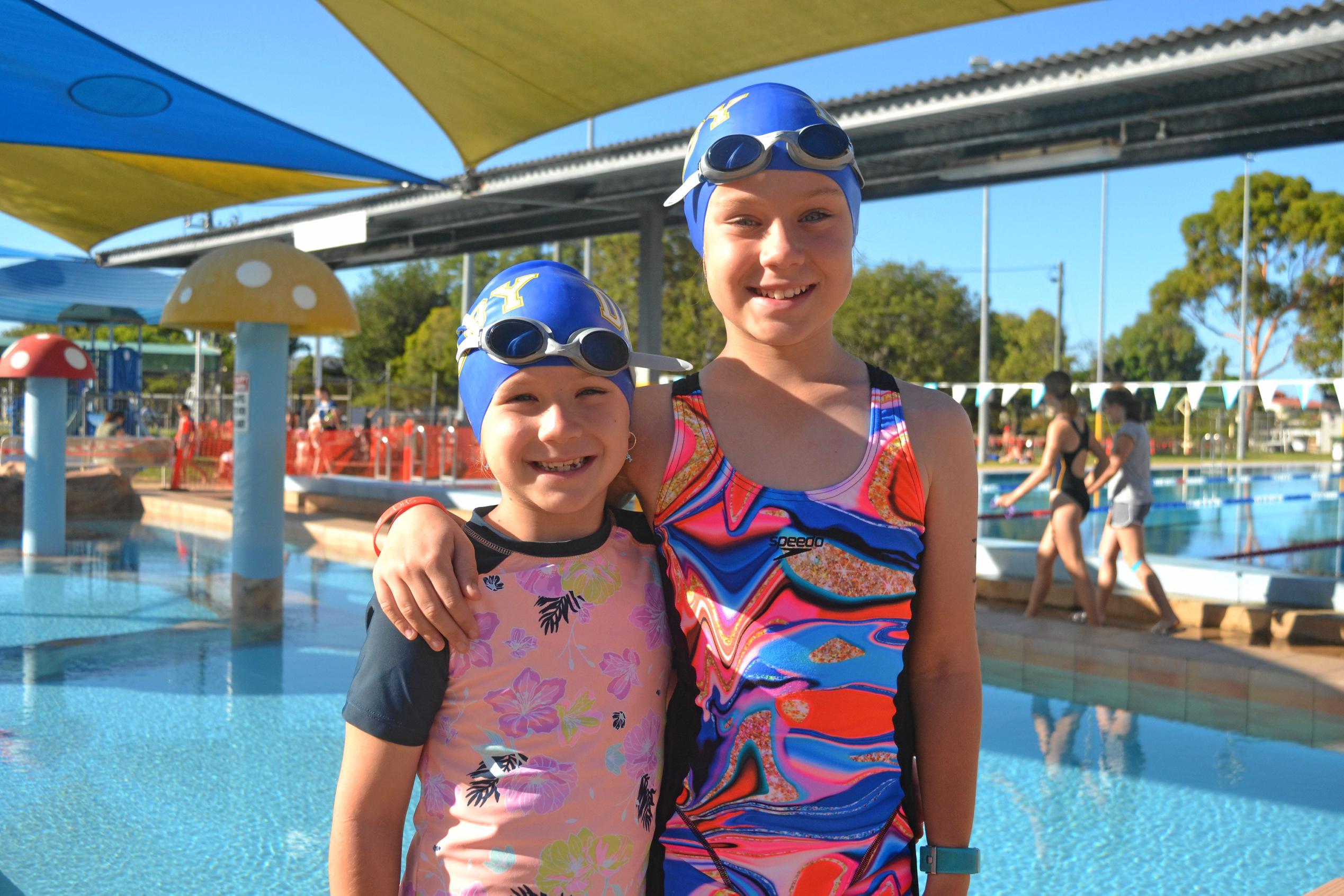 Hayley and Ella Schultz getting ready for their big swim. Picture: Meg Gannon