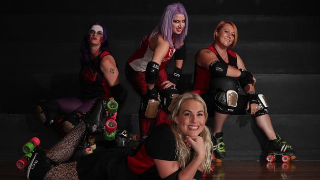 At the Runaway Bay Indoor Sports Stadium pre-COVID-19 are members of the East Coast Derby Dolls J'Aime Bache aka Medusa Damage (front), Nikki Kay aka Bravetart, Lucy Fouche aka Lucious and Laura Hoad aka Crank. Picture by Scott Fletcher