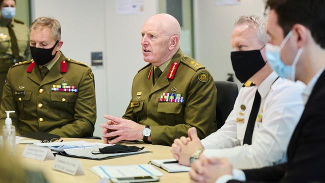 Lieutenant General John Frewen (centre) on a zoom meeting with state premiers and chief ministers. Picture: Getty Images