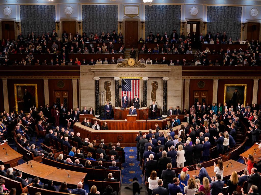 The Democratic side of the chamber responded with groans and visible frustration, particularly when Trump praised police officers and promised to give them ‘the support, protection and respect they so dearly deserve.’ Photo by allison robbert / AFP