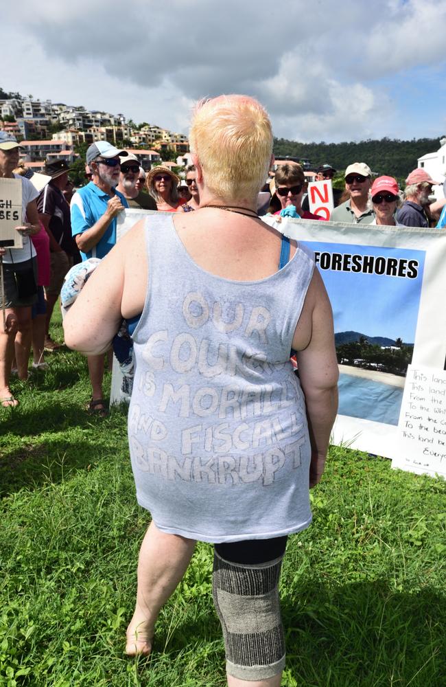 An attendee of the Port of Airlie resort protest wears a shirt declaring ‘Our council is morally and fiscally bankrupt’. Picture: Supplied