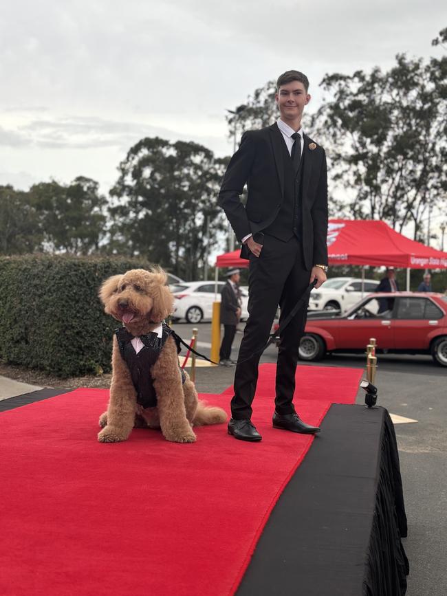 The students of Urangan State High School arriving at their formal.