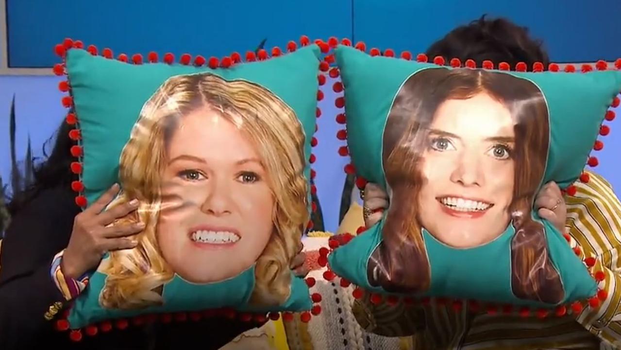 The new hosts hide behind McLennan (left) and McCartney.