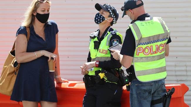 Border bubble opens to Northern NSW essential service workers. Police at the Queensland border on Griffith Street Coolangatta. Picture: NIGEL HALLETT