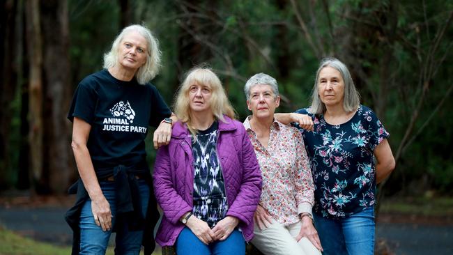 Jan Primrose (second from the left) Jill Green and Joan Rowley pose for photographs at Cumberland State Forest in West Pennant Hills. Picure: Angelo Velardo