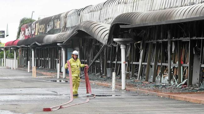 A firefighter starts to pack up after checking for spot fires. Picture: Anthony Reginato