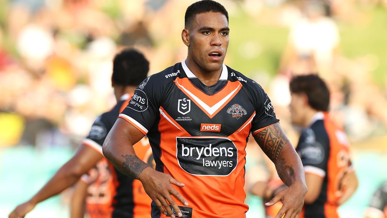 Joe Ofahengaue of the Tigers watches on during an NRL trial match