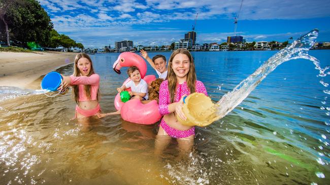 Weather.Siblings Zahra, 11, Jesse, 4, Ashton, 14 Illich from Runaway Bay and Billie Frampton, 11 from Arundel cool off at Budds Beach. Picture: NIGEL HALLETT** Michelle MUM ** 0403262126 ***