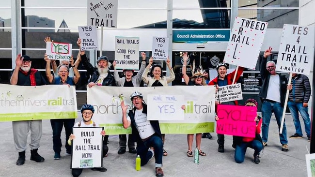 Northern Rivers Rail Trail Supporters celebrate council awarding a tender to build the new track on formation.