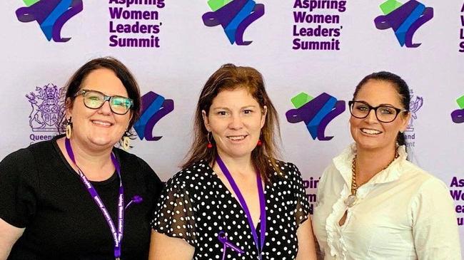 Loretta Johnson (centre), with colleagues Danielle Walton (left) and Morgann Farndon (right) representing the Queensland Ambulance Service at the Aspiring Women Leaders Summit. Picture: Jorja McDonnell