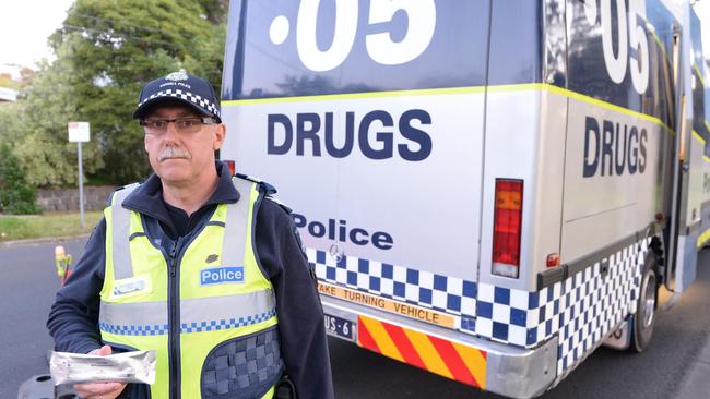 Sgt David Young with a drug test kit. Picture: Lawrence Pinder